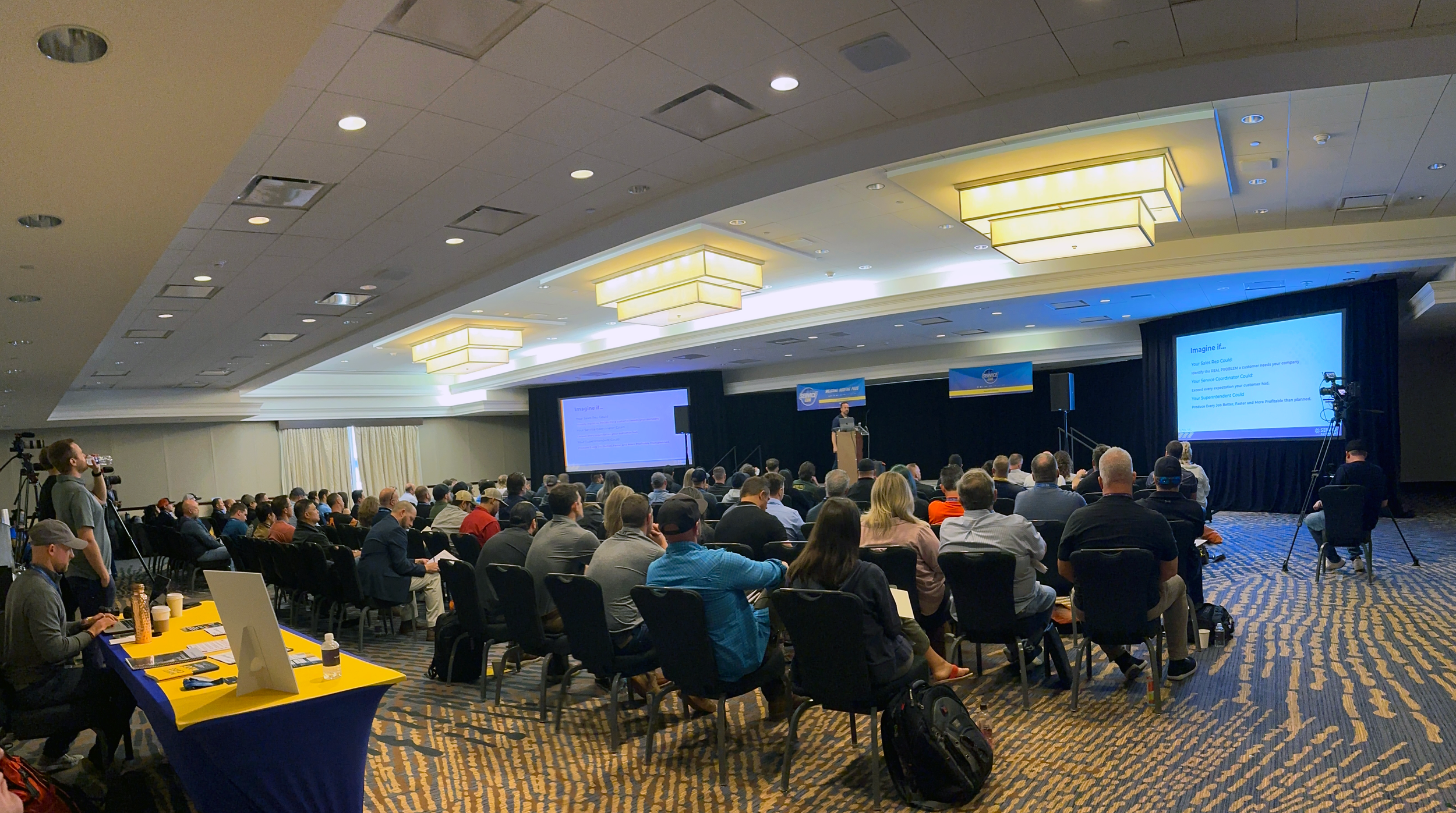 Commercial roofing service leaders learning together at ServiceCon